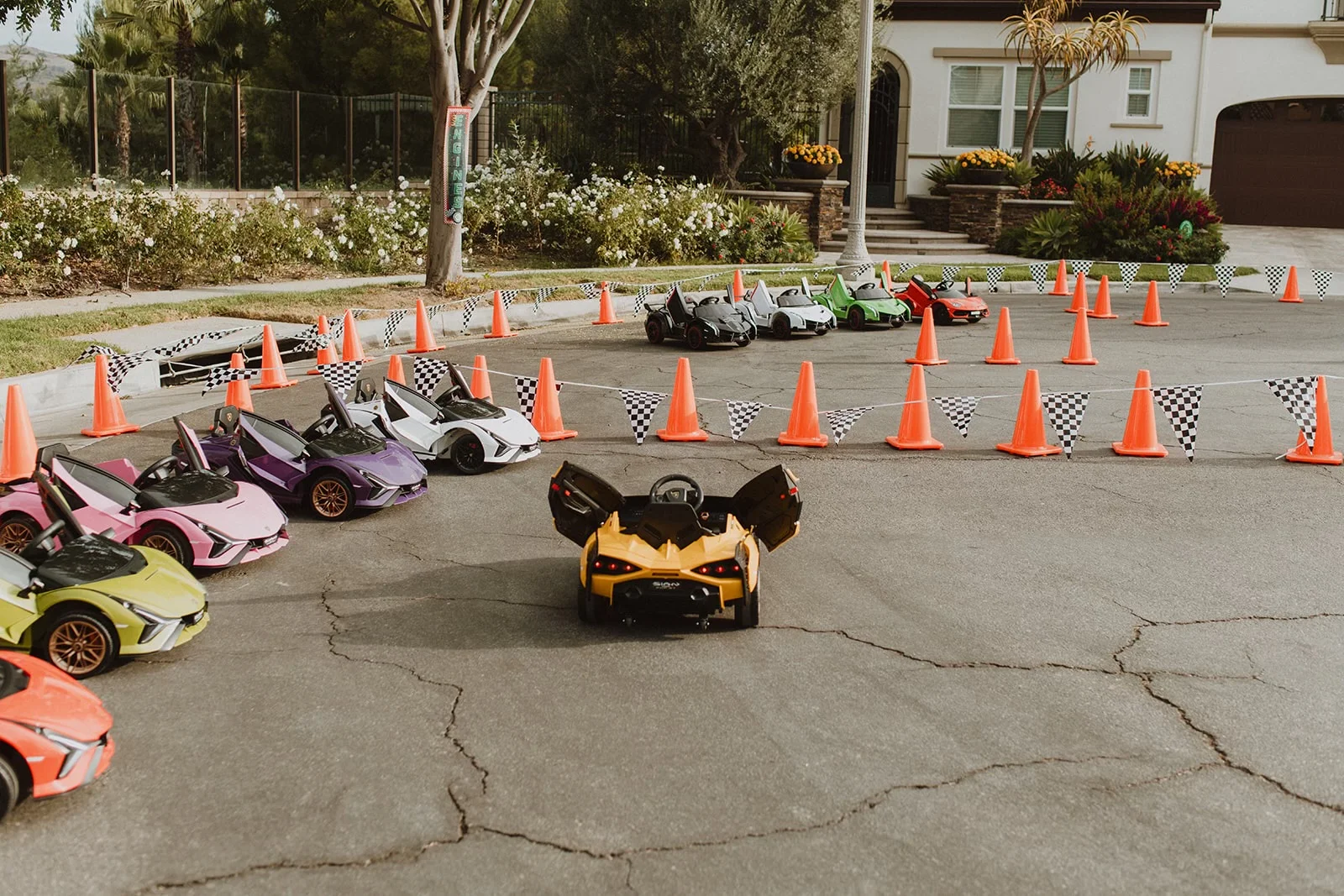 A Little Racers OC branded Lamborghini racetrack setup ready for a Long Beach birthday party